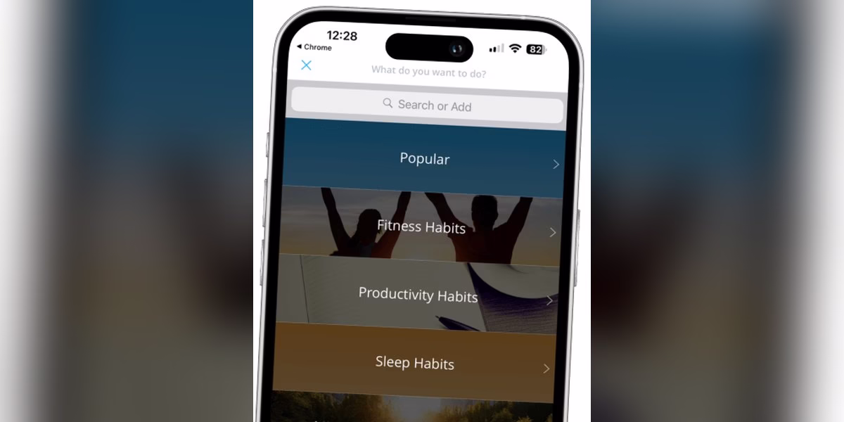 Coach.me habit tracker app on a phone